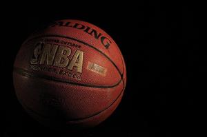 A Spaulding Basketball With Black Background