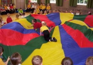 Group Playing with Parachute